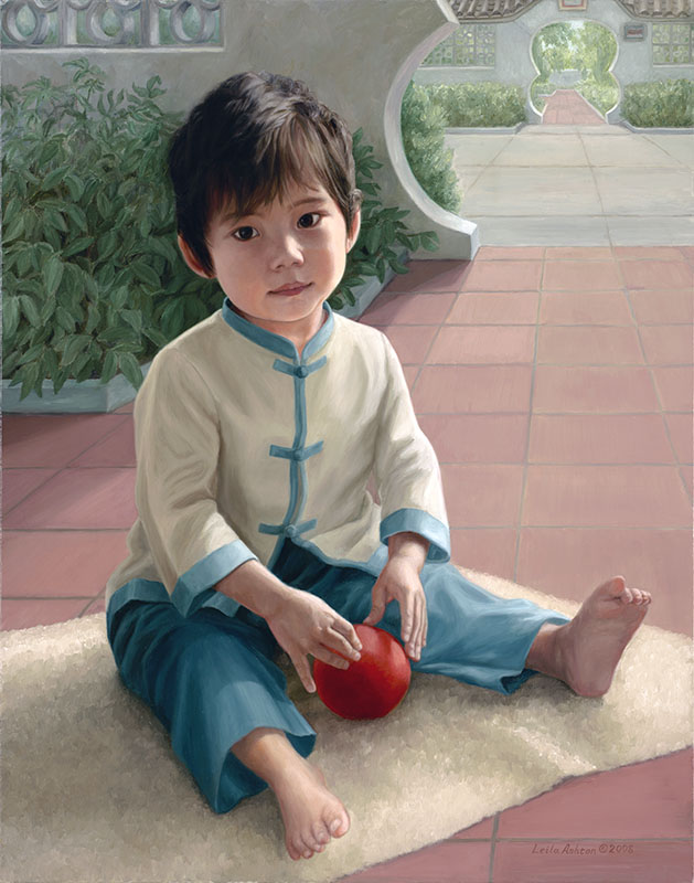 small Chinese child with red ball