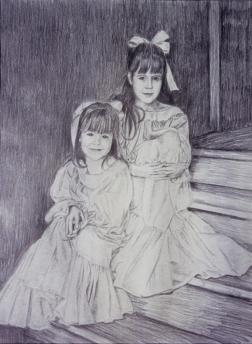 Two children in gowns on steps