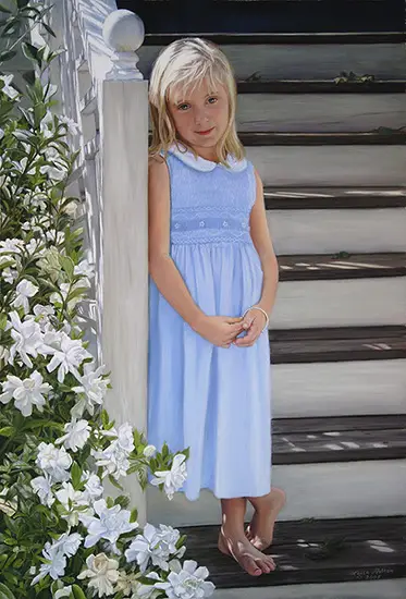 Girl in blue dress on stairs